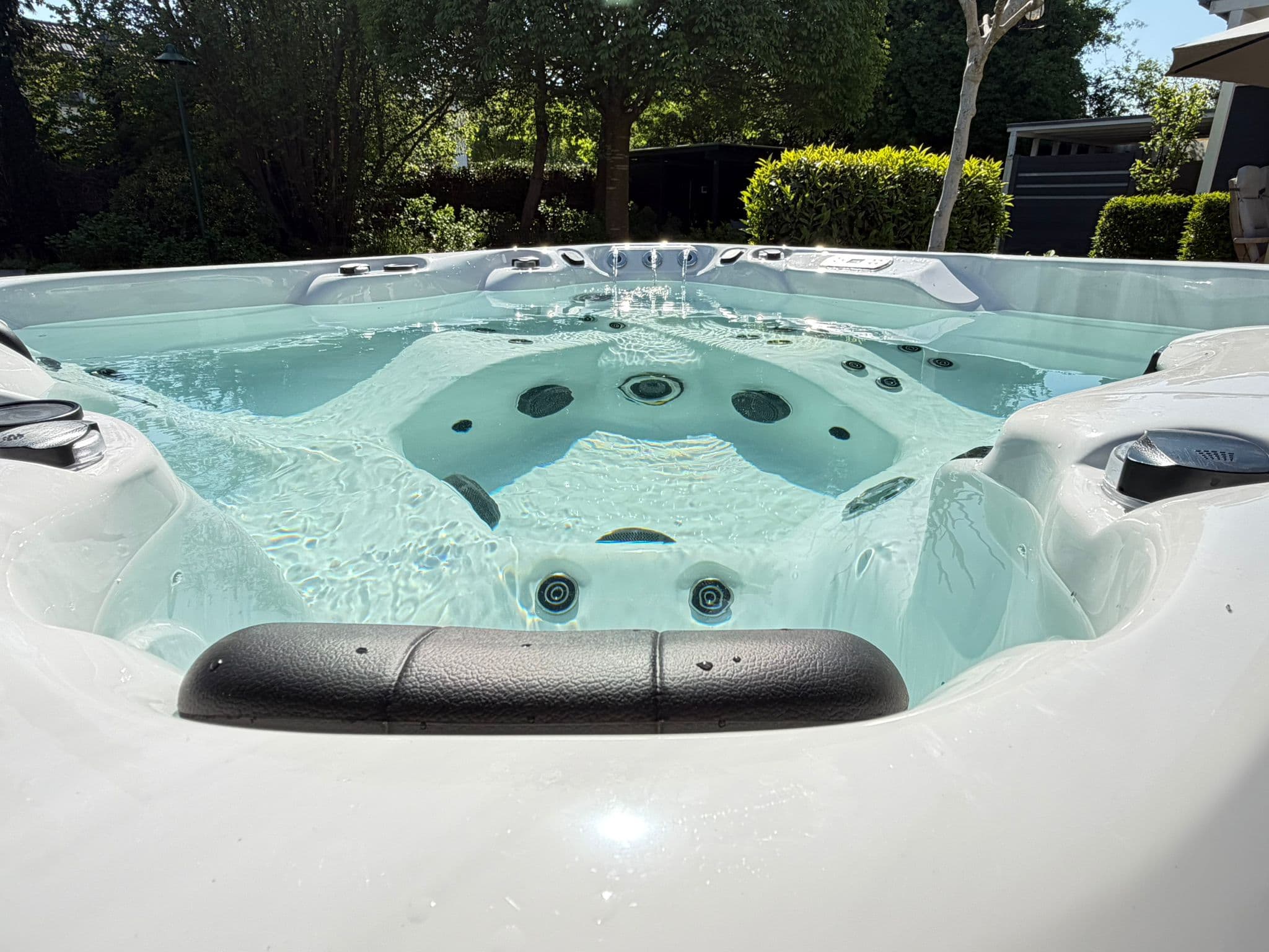 Earth Spas hot tub in a garden